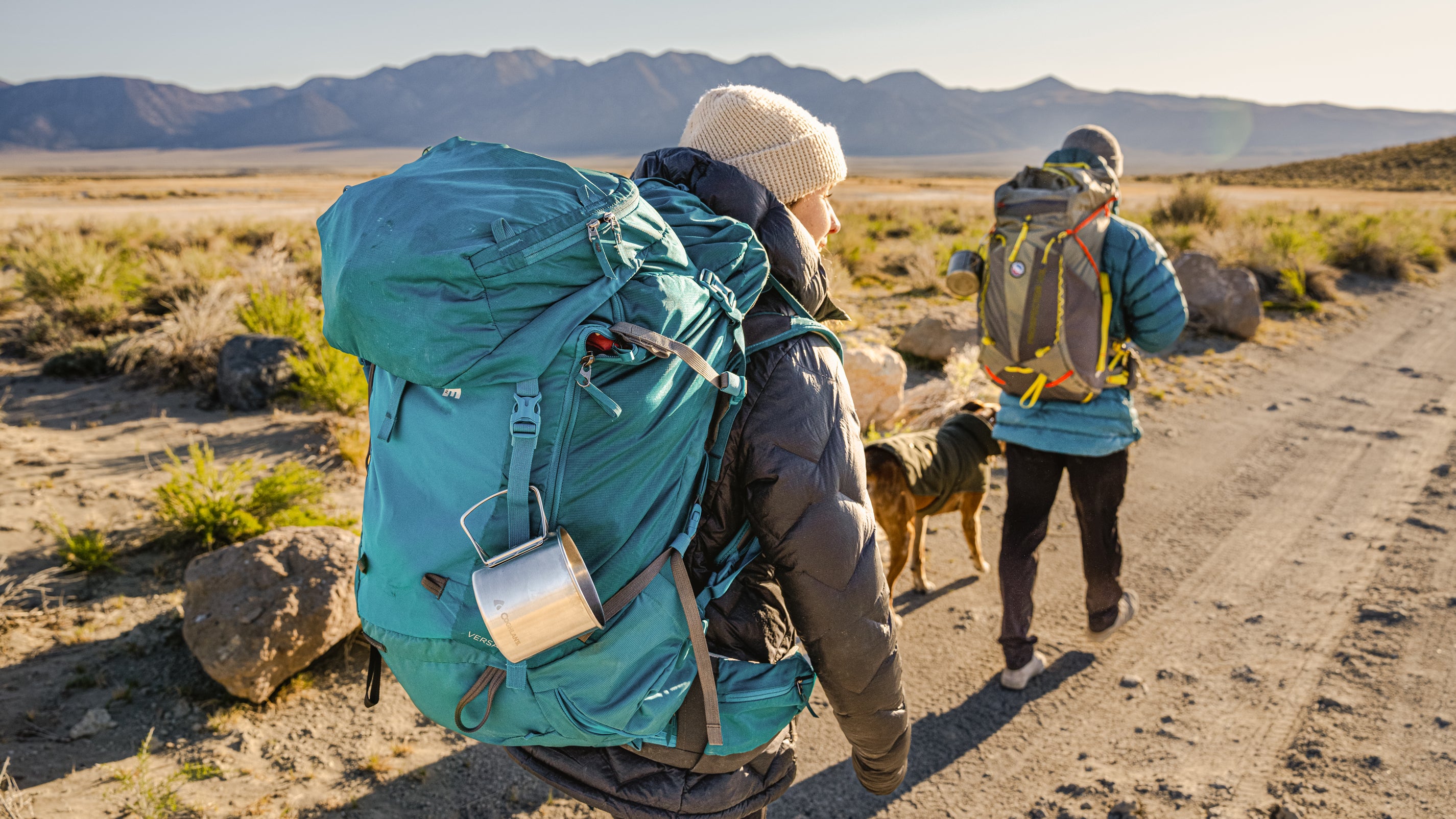 A couple hiking with backpacks